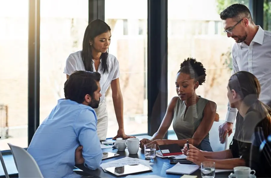 Picture of a group of people during a meeting.